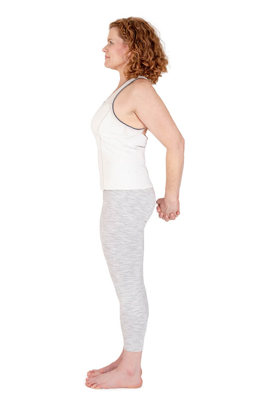 mountain pose hands behind back